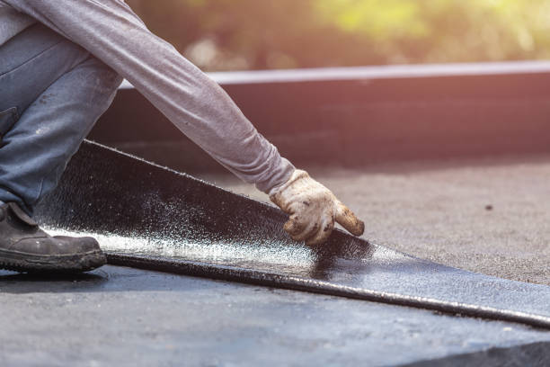 Professional Waterproofing technician working in Winn, MI